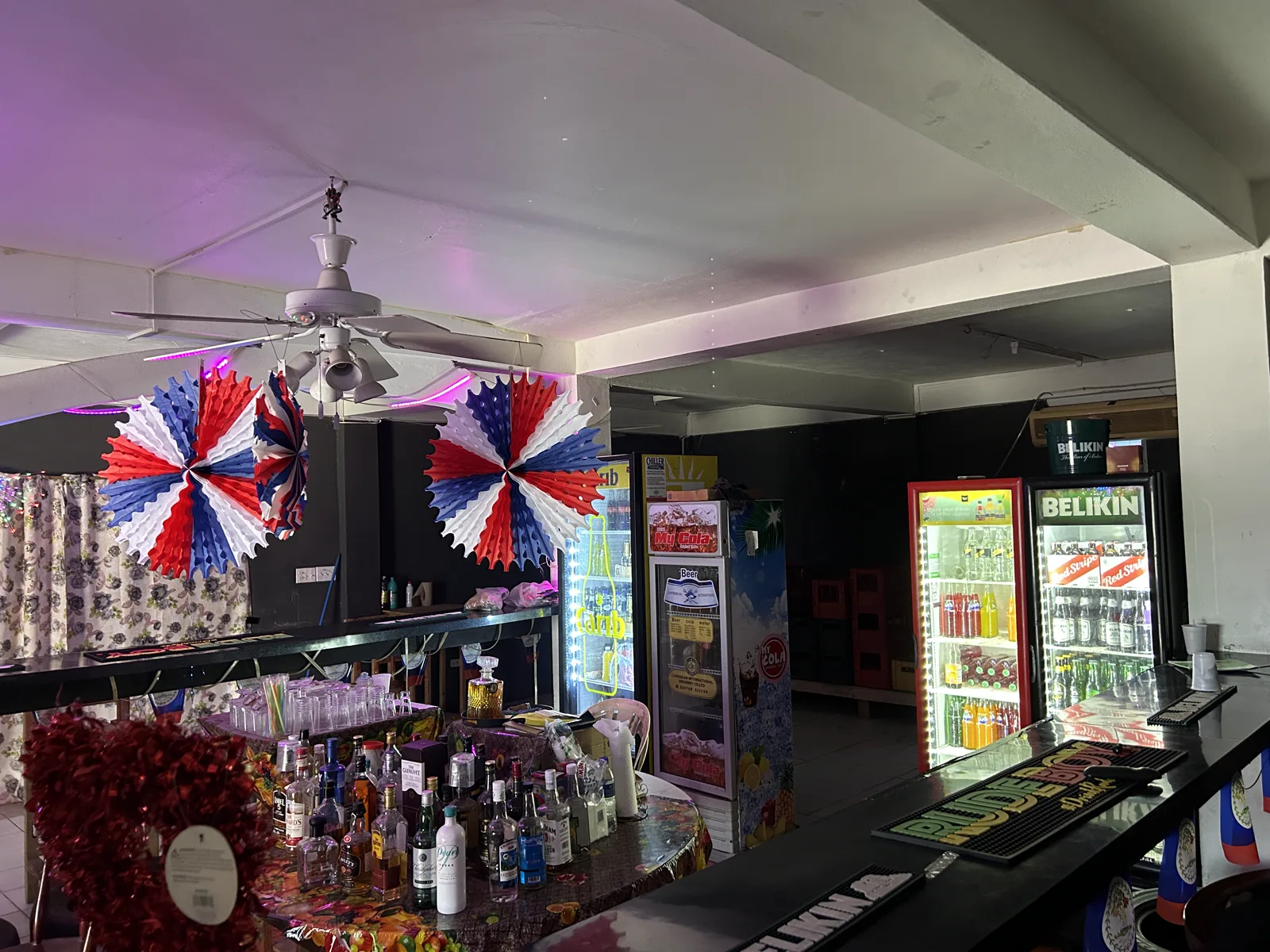 Wide view of the bar and lounge area with festive decorations